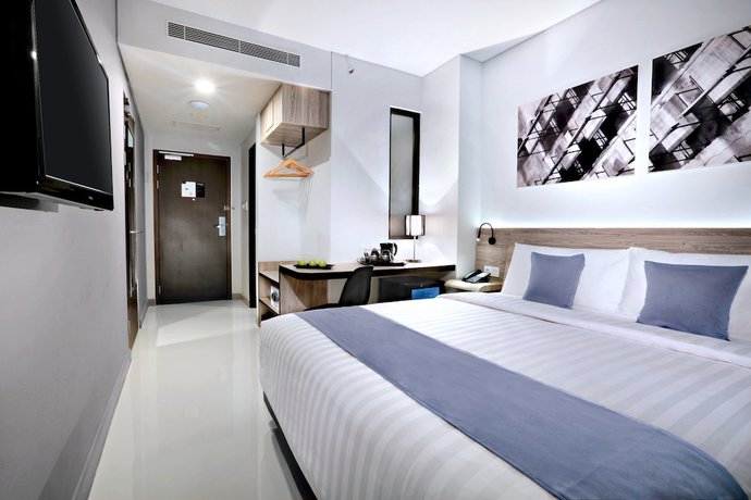 Imagen de la habitación del Hotel Hotel Neo Gajah Mada Pontianak by ASTON. Foto 10