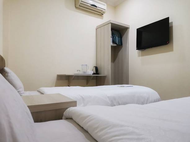Imagen de la habitación del Hotel Hotel Nusantara Indah Syariah. Foto 6