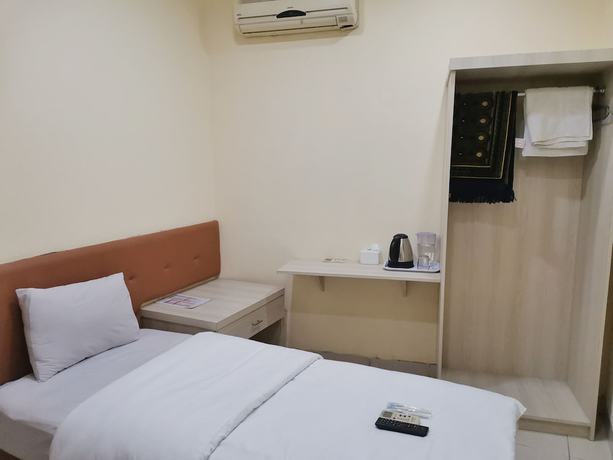 Imagen de la habitación del Hotel Hotel Nusantara Indah Syariah. Foto 7