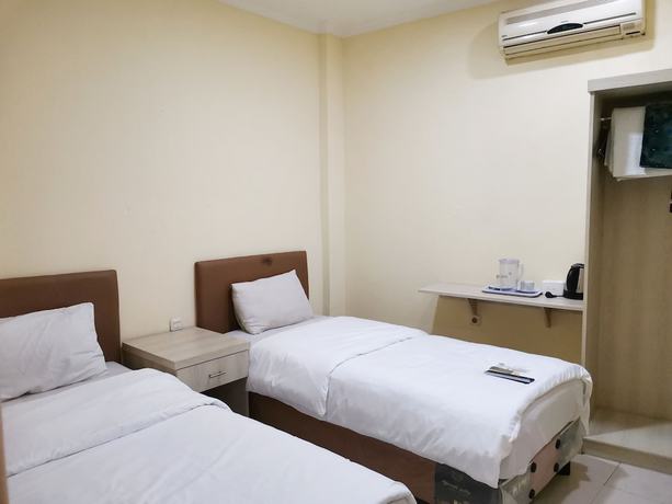 Imagen de la habitación del Hotel Hotel Nusantara Indah Syariah. Foto 8