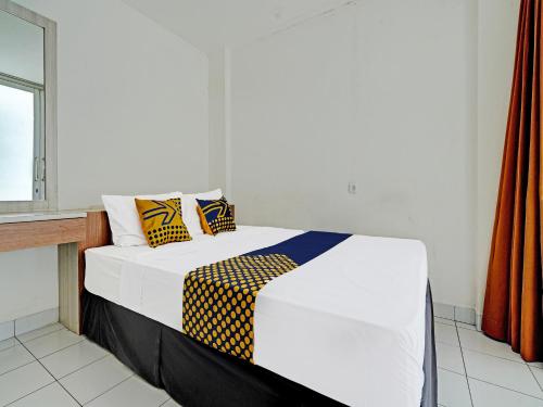 Imagen de la habitación del Hotel Hotel O Alamanda 7 Syariah. Foto 16
