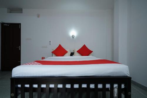 Imagen de la habitación del Hotel Hotel O Aluva Town. Foto 1