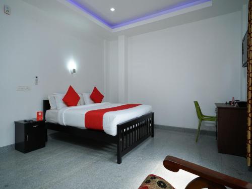 Imagen de la habitación del Hotel Hotel O Aluva Town. Foto 4