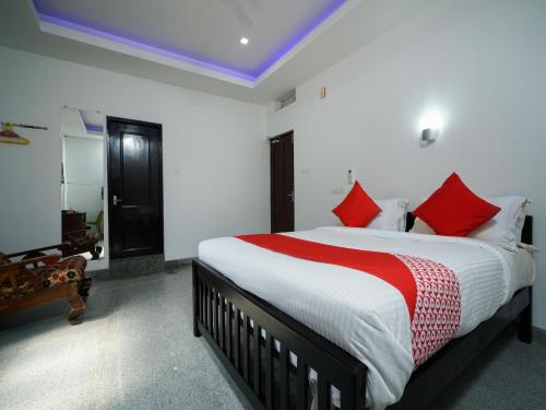 Imagen de la habitación del Hotel Hotel O Aluva Town. Foto 7