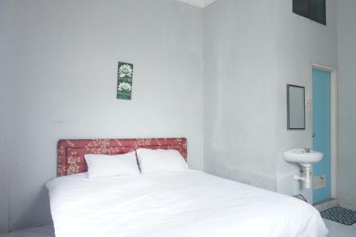 Imagen de la habitación del Hotel Hotel O Azeela Kost Syariah. Foto 17