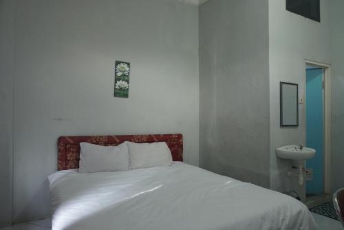 Imagen de la habitación del Hotel Hotel O Azeela Kost Syariah. Foto 19
