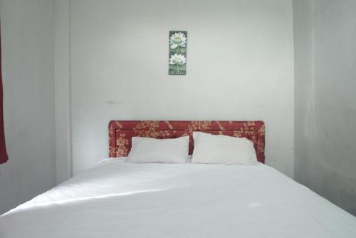 Imagen de la habitación del Hotel Hotel O Azeela Kost Syariah. Foto 20