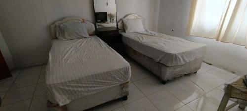 Imagen general del Hotel Hotel O Azeela Kost Syariah. Foto 14