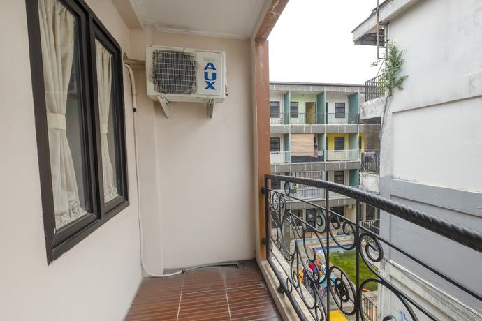 Imagen de la habitación del Hotel Hotel O Cibubur Near Cibubur Junction Formerly Comfort Residence. Foto 15