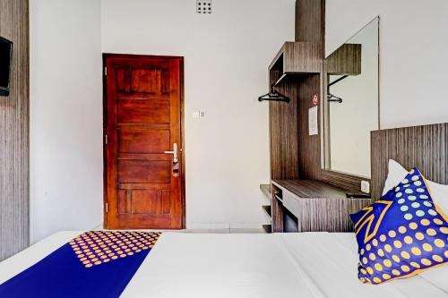 Imagen de la habitación del Hotel Hotel O Cihampelas Near Ciwalk Formerly D'River Guest House. Foto 17