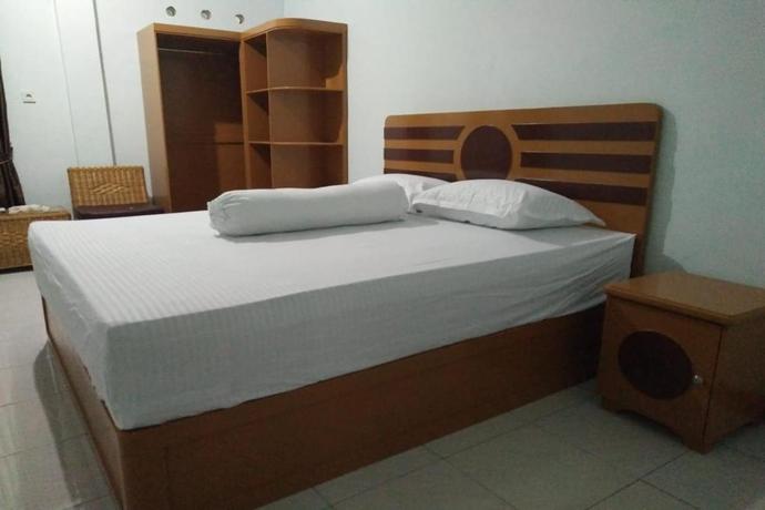 Imagen de la habitación del Hotel Hotel O Fanilly Guest House MarabahanNearJembatan Rumpiang. Foto 2