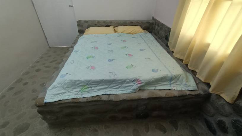 Imagen de la habitación del Hotel Hotel O Flinstone Lodge. Foto 8