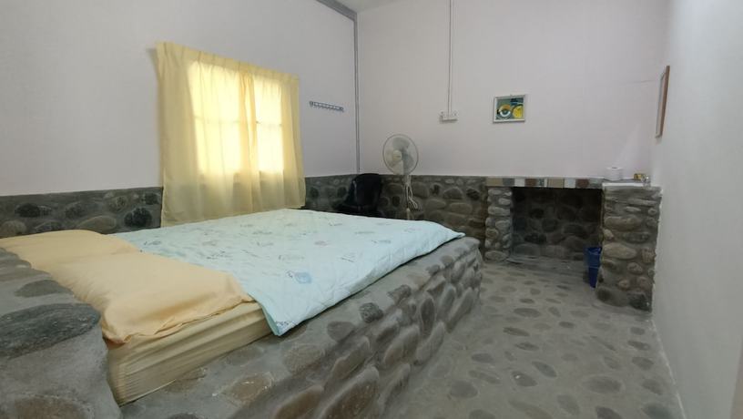Imagen de la habitación del Hotel Hotel O Flinstone Lodge. Foto 10