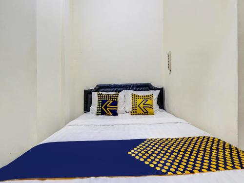 Imagen de la habitación del Hotel Hotel O Gang Tengah Homestay Syariah. Foto 12