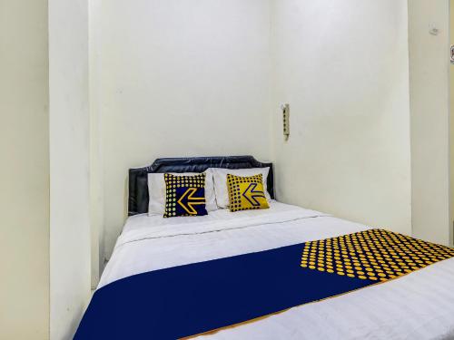 Imagen de la habitación del Hotel Hotel O Gang Tengah Homestay Syariah. Foto 14