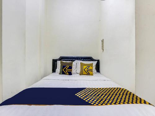 Imagen de la habitación del Hotel Hotel O Gang Tengah Homestay Syariah. Foto 15