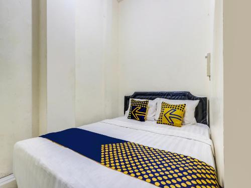 Imagen de la habitación del Hotel Hotel O Gang Tengah Homestay Syariah. Foto 16