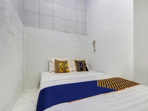 Imagen de la habitación del Hotel Hotel O Gang Tengah Homestay Syariah. Foto 19