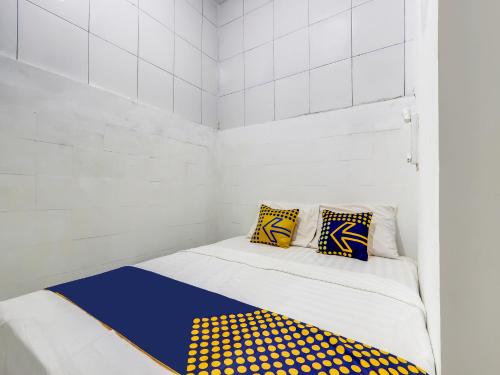 Imagen de la habitación del Hotel Hotel O Gang Tengah Homestay Syariah. Foto 20