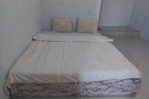 Imagen de la habitación del Hotel Hotel O Guest House Cinta Damai. Foto 19