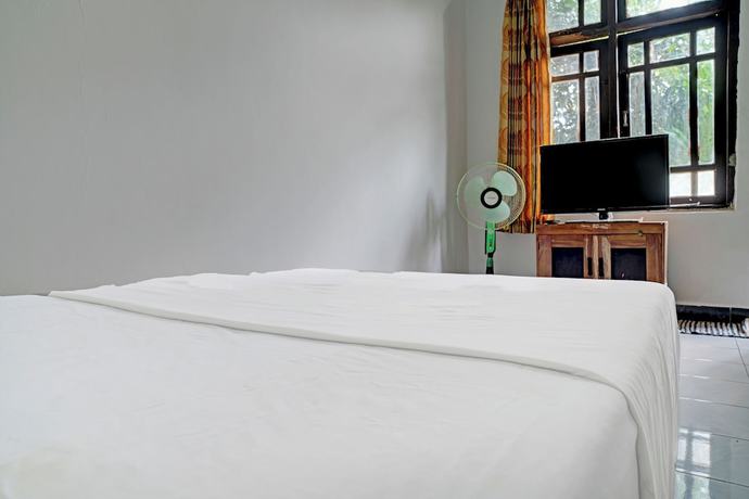Imagen de la habitación del Hotel Hotel O Home Stay Syariah Aom Kusman. Foto 3