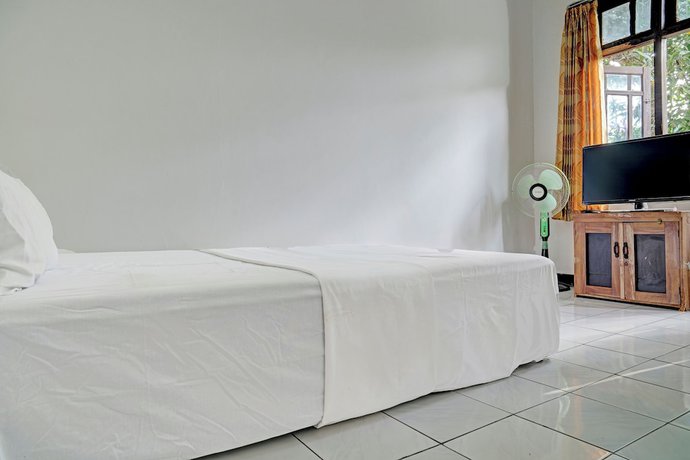 Imagen de la habitación del Hotel Hotel O Home Stay Syariah Aom Kusman. Foto 8