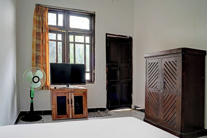 Imagen de la habitación del Hotel Hotel O Home Stay Syariah Aom Kusman. Foto 9