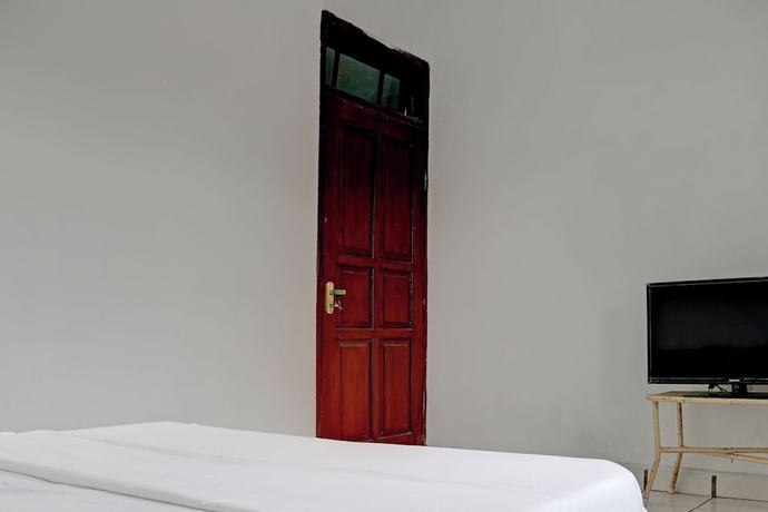 Imagen de la habitación del Hotel Hotel O Home Stay Syariah Aom Kusman. Foto 11
