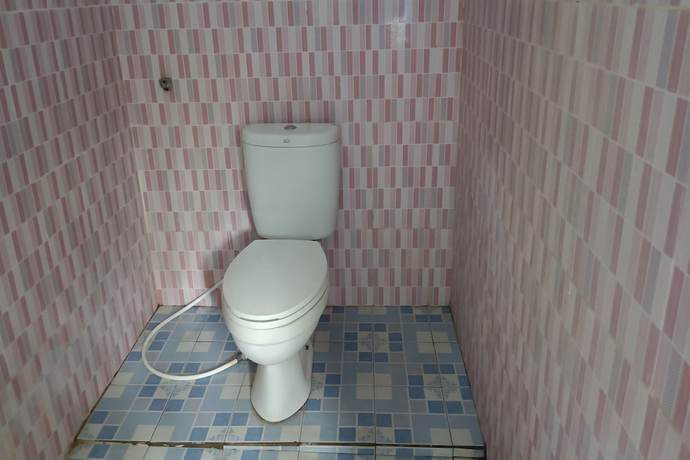 Imagen de la habitación del Hotel Hotel O Kawi Homestay. Foto 4