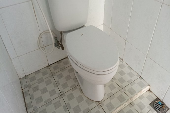 Imagen de la habitación del Hotel Hotel O Kawi Homestay. Foto 5