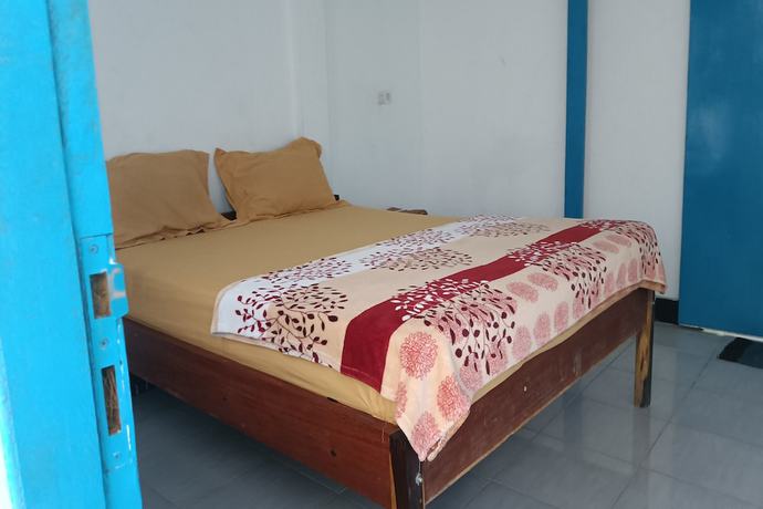 Imagen de la habitación del Hotel Hotel O Kawi Homestay. Foto 6