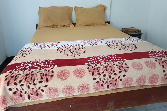 Imagen de la habitación del Hotel Hotel O Kawi Homestay. Foto 8