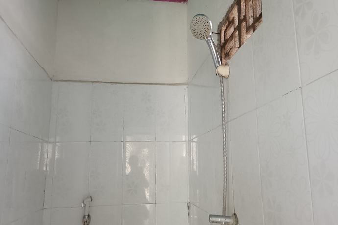 Imagen de la habitación del Hotel Hotel O Kawi Homestay. Foto 9