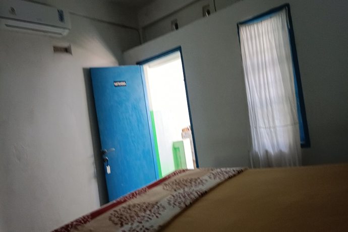 Imagen de la habitación del Hotel Hotel O Kawi Homestay. Foto 13