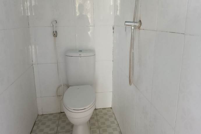Imagen de la habitación del Hotel Hotel O Kawi Homestay. Foto 14