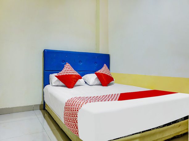 Imagen de la habitación del Hotel Hotel O Kos'ta Homestay Makassar. Foto 1