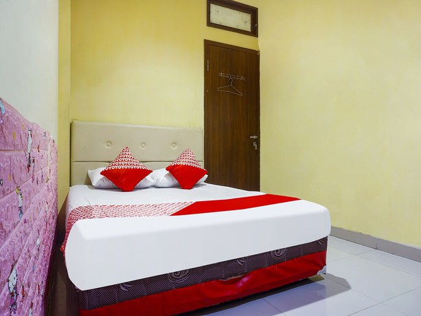Imagen de la habitación del Hotel Hotel O Kos'ta Homestay Makassar. Foto 2