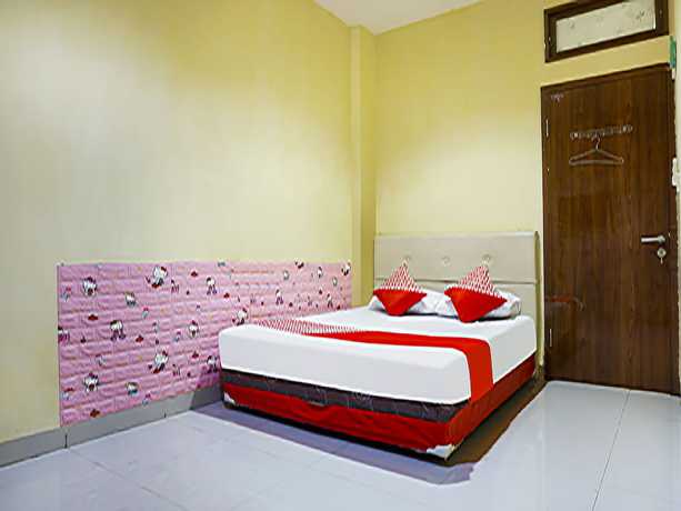 Imagen de la habitación del Hotel Hotel O Kos'ta Homestay Makassar. Foto 3
