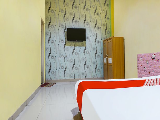 Imagen de la habitación del Hotel Hotel O Kos'ta Homestay Makassar. Foto 5