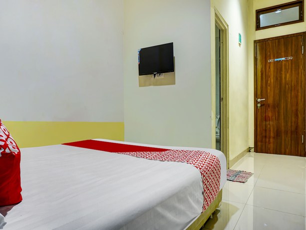 Imagen de la habitación del Hotel Hotel O Kos'ta Homestay Makassar. Foto 7