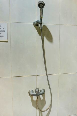 Imagen de la habitación del Hotel Hotel O Kos'ta Homestay Makassar. Foto 10