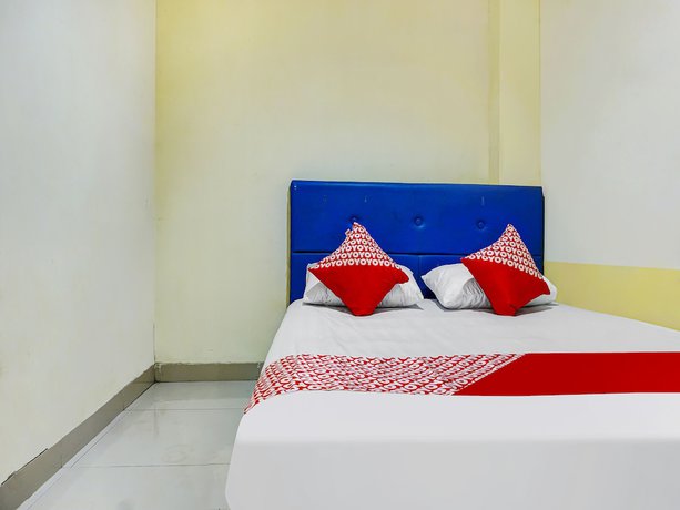 Imagen de la habitación del Hotel Hotel O Kos'ta Homestay Makassar. Foto 11