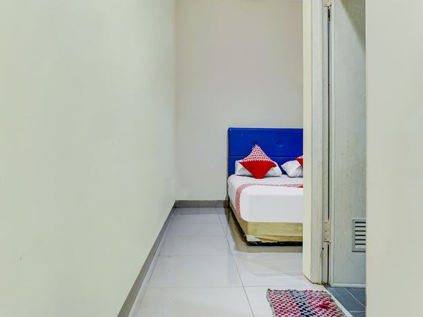 Imagen de la habitación del Hotel Hotel O Kos'ta Homestay Makassar. Foto 12