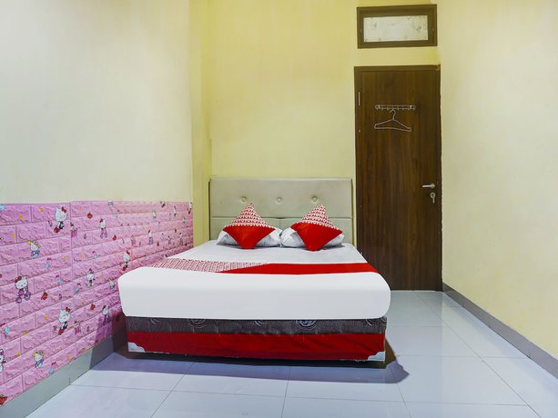 Imagen de la habitación del Hotel Hotel O Kos'ta Homestay Makassar. Foto 13
