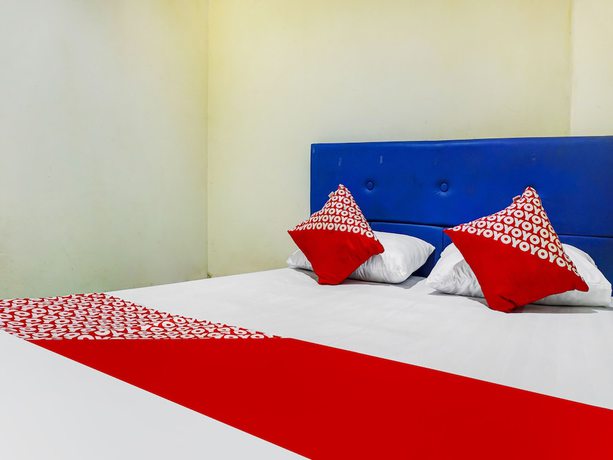 Imagen de la habitación del Hotel Hotel O Kos'ta Homestay Makassar. Foto 14