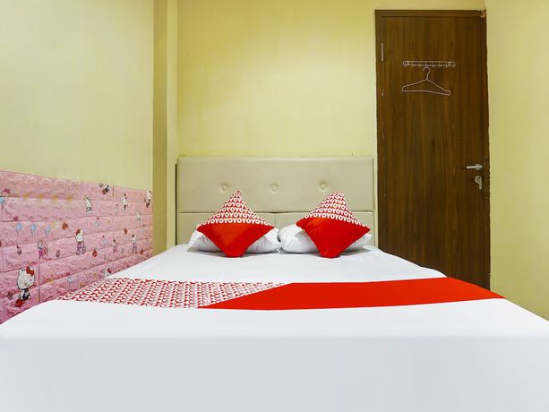 Imagen de la habitación del Hotel Hotel O Kos'ta Homestay Makassar. Foto 16