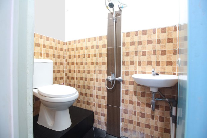 Imagen de la habitación del Hotel Hotel O Lumungga Residence Syariah. Foto 4