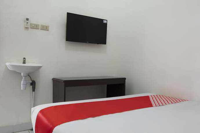 Imagen de la habitación del Hotel Hotel O Lumungga Residence Syariah. Foto 6