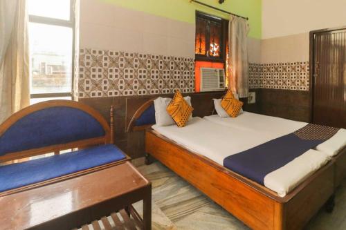 Imagen de la habitación del Hotel Hotel O Maitry. Foto 9