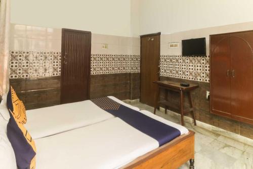 Imagen de la habitación del Hotel Hotel O Maitry. Foto 13